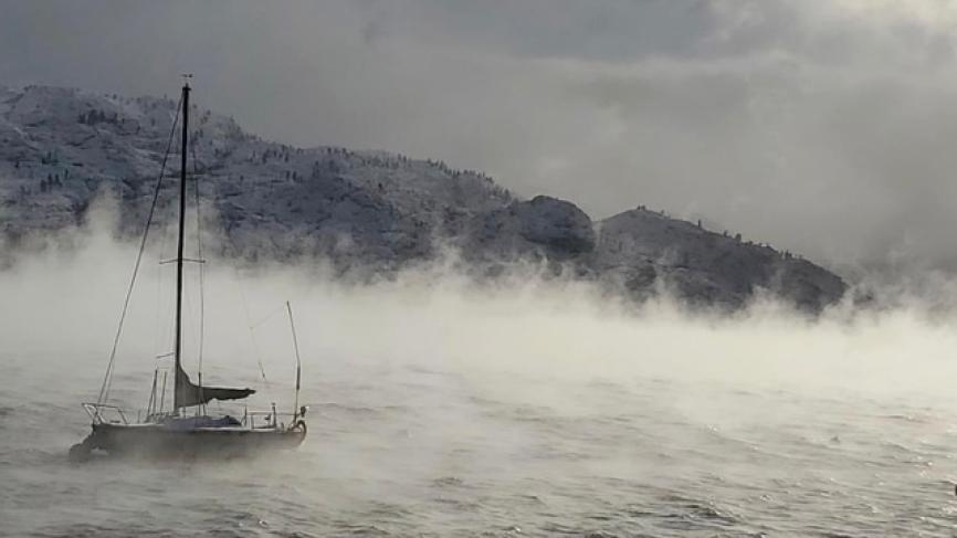 Winter mist and sailboat